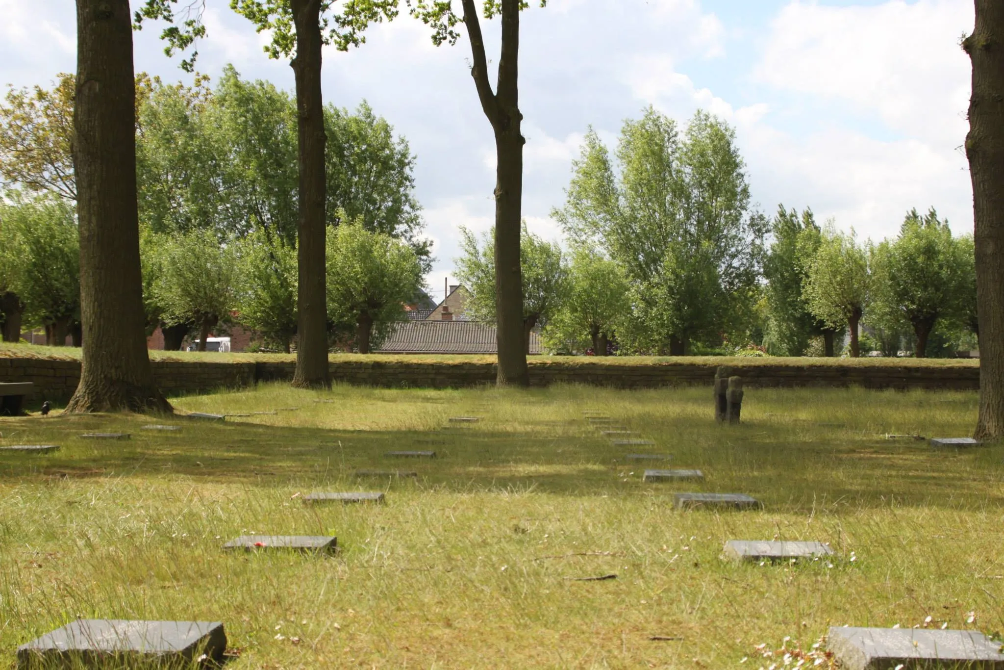 Flat stones mark the mass graves of the German war dead.