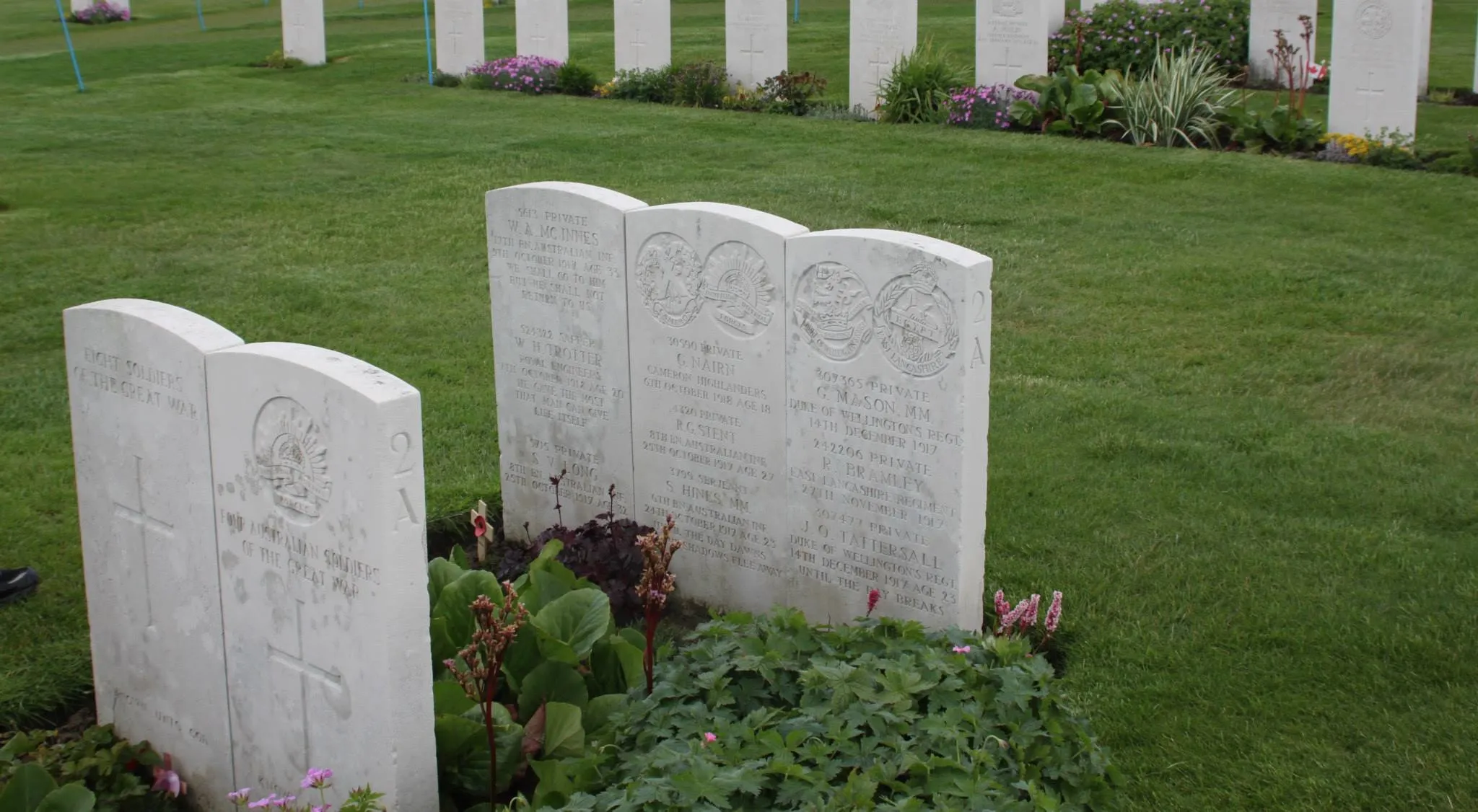 A set of 3 and 2 headstones mark a group of soldiers whose remains were not able to be individually identified.